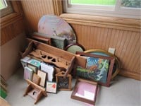 Large grouping of pictures and wooden shelf