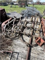 Antique three row filled cultivator.