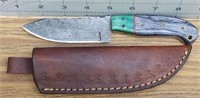 Damascus steel knife with leather sheath