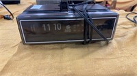 One general electric radio/alarm clock one Daul