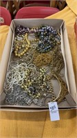 Box of costume jewelry  necklaces