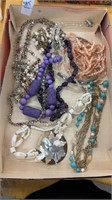 Small box of costume jewelry necklaces