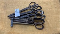 Lot of metal scissors, and small hammer