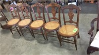 5 Victorian walnut carved caned chairs