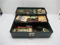 metal tackle box with assorted vintage tackle
