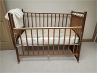 Vintage Baby Crib with Blankets