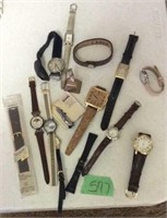 Assorted watches and copper bell