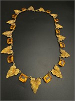 Beautiful art deco amber colored glass leaf neckl