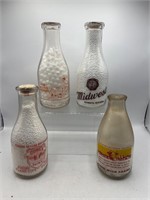 Vintage glass dairy bottles