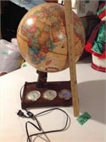 Electronic light up globe with barometer