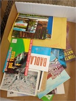 Vintage travel brochures and postcards