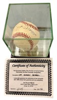 Joe Dimaggio yellowed autographed baseball