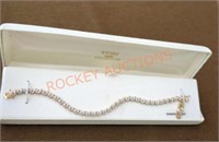 Tennis bracelet 18kt gold over sterling silver