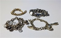 Four Silver Fashion Bracelets