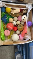 Box of golf balls and miscellaneous toys