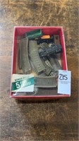 Toy, train, and parts in a box