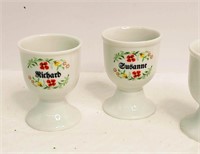 4 Monogram Egg Cups.  Porcelain 2.75" h