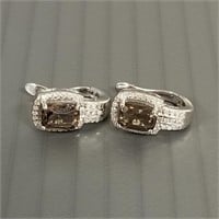 Pair of sterling earrings set with diamonds &