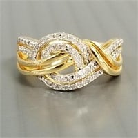 Sterling ring set with .25 tcw diamonds; size 7