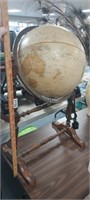 ANTIQUE GLOBE ON A STAND