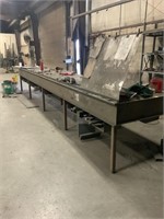 Long, steel welding table
20 feet long 3 feet