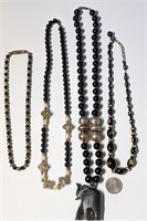 Four Black Beaded Necklaces