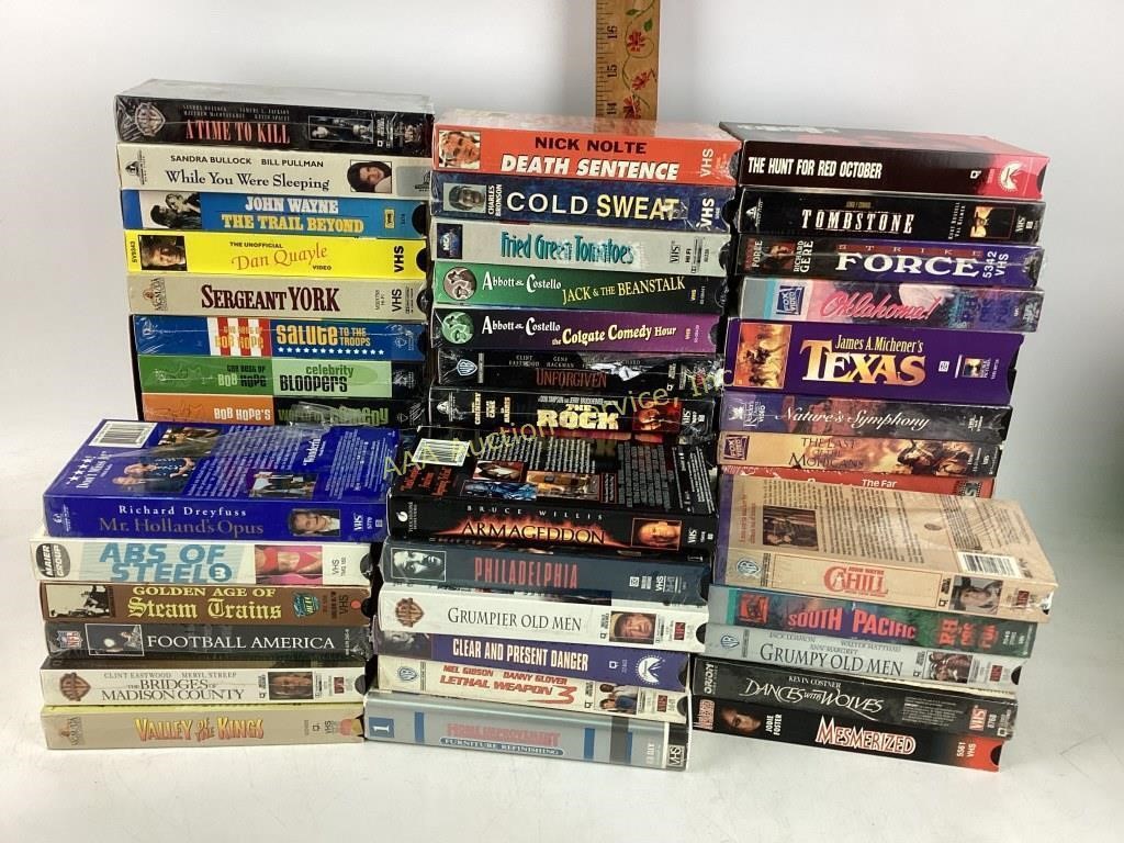 VHS tapes including Rembering Ellis Island, Bob