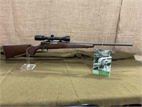 Remington rifle with scope, Model 700, 221