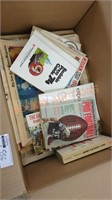 Vintage sports guides and newspapers
