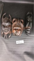 Tribal wooden face plaques