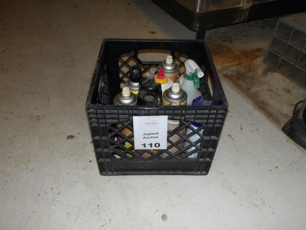 milk crate of various supplies