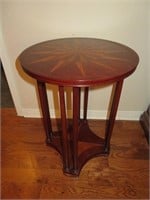 A Two Tier Center Table With Exotic Inlay