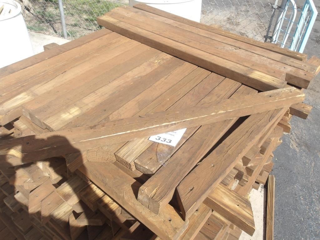 Pallet of various treated wood