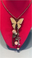 Butterfly Key and other charms costume necklace