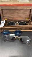Wooden box and sunglasses
