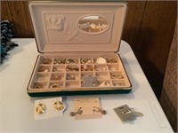 green jewelry box and earrings