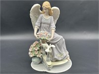 Porcelain Seated Angel Figurine w/ Bird & Flower