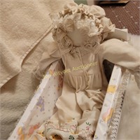 Pillowcase Doll and Wicker Bed