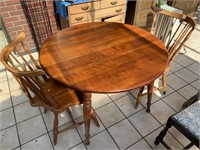 ROUND MAPLE TABLE AND 2 CHAIRS