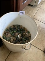 GLASS MARBLES IN BUCKET