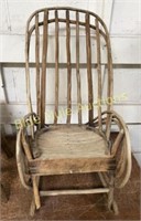 Child’s rustic rocking chair