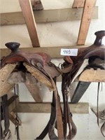 Older Roping saddle and youth saddle