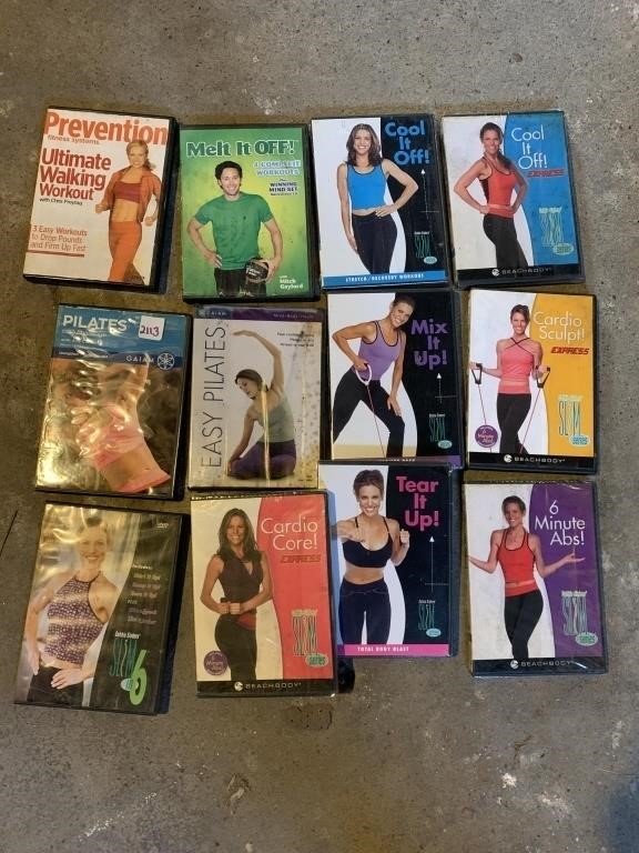 12 WORKOUT DVDS, SOME SEALED