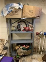 HOLIDAY DÉCOR ALL ON METAL SHELF AND 3 LAWN BALLS