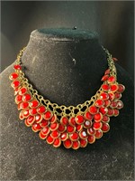 RED BEADED AND GOLD TONE SET