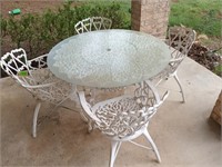 Cast aluminum patio table with 4 chairs 27x45