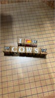 I love pigs cows bears and dolls wooden blocks