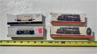 4 Train Cars/Engines with Original Boxes (back