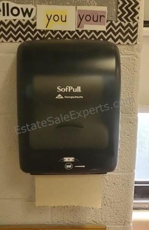Paper towel dispenser. Buyer must remove from