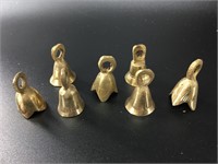 Seven antique brass temple bells. Each is approx..